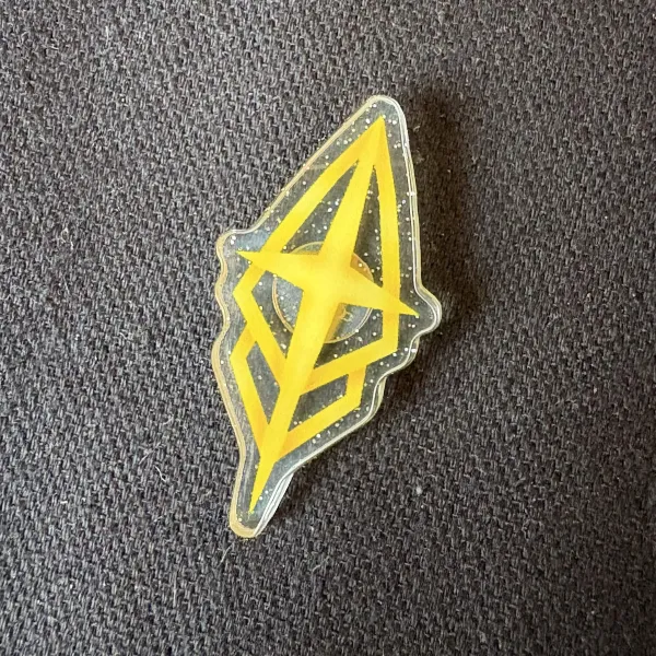 Medarda crest (Mel) glitter acrylic pin