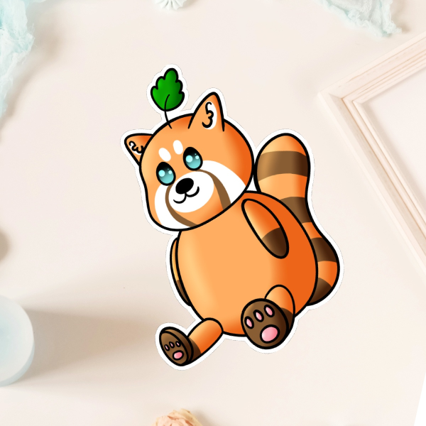 Red panda sitting with leaf on top