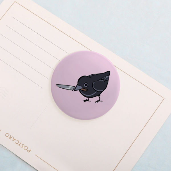 Raven with a knife button pin