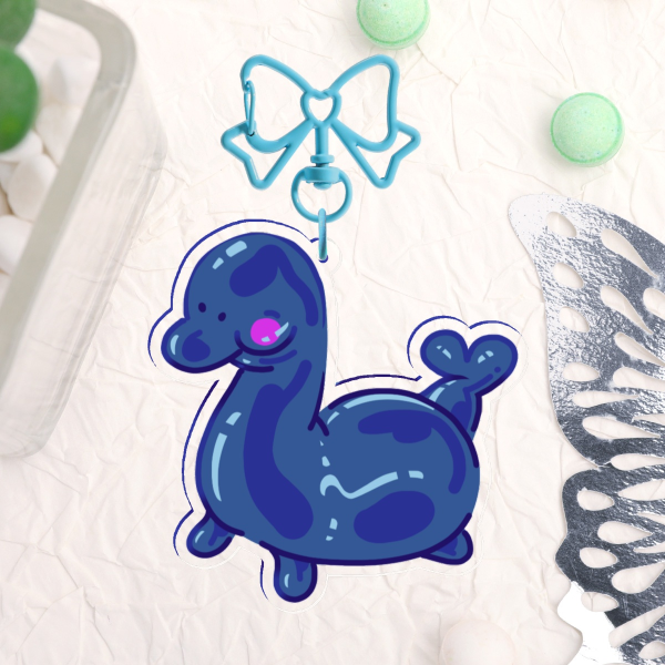 CRYPTID | Nessie Toy Double-Sided Acrylic Charm Clear